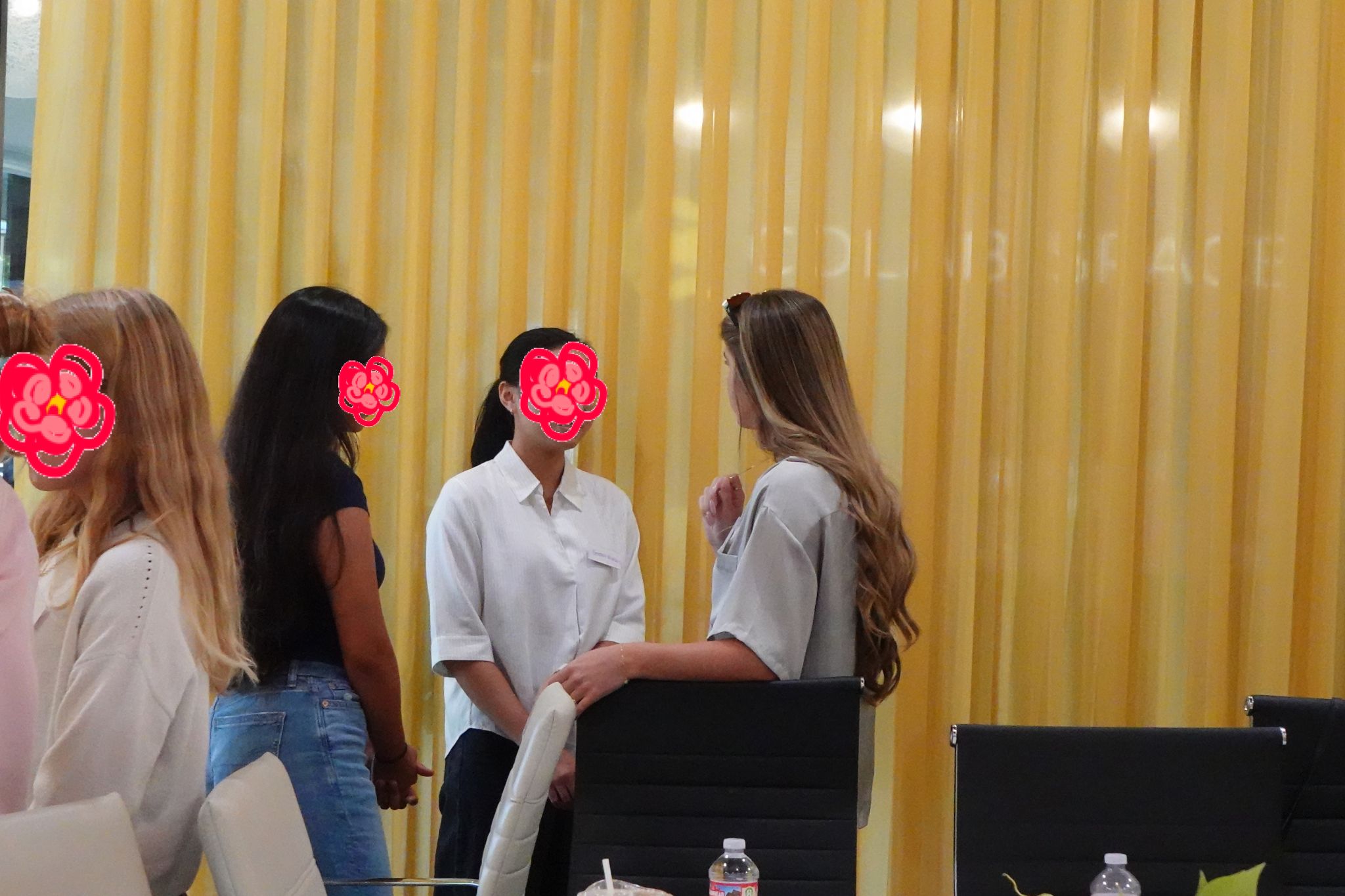 Group of mentees laughing with a mentor